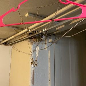 Layered gold necklace with crystal